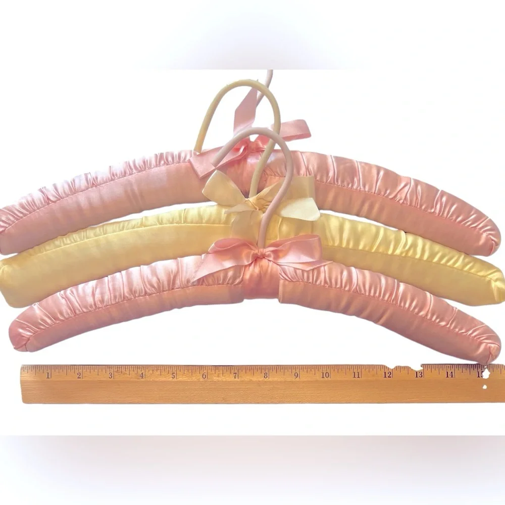 Three Luxurious Padded Satin Hangers-2 Pink and 1 Yellow Hanger.
